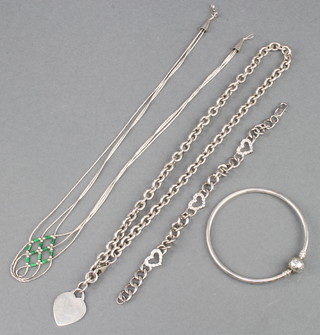 A silver necklace, a gem set ditto, a bracelet and bangle 81 grams