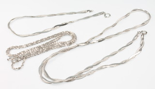 A 9ct white gold fancy link bracelet 7", an ensuite necklace 17 1/2" and a ditto 20", 8.2 grams 