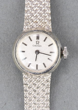 A lady's 9ct white gold Omega wristwatch approx. 16 grams,  with original box 