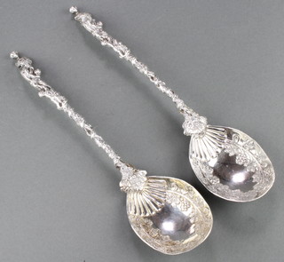 A pair of Victorian silver serving spoons with vinous bowls, twist handles and figural finials, London 1889, 232 grams 