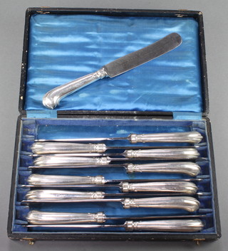 A set of 12 Dutch silver handled dinner knives 