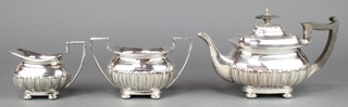 A Victorian silver plated demi-fluted 3 piece tea set