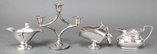 A silver plated sauce boat and minor plated items