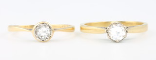 2 18ct yellow gold single stone diamond rings size O 1/2 and N

