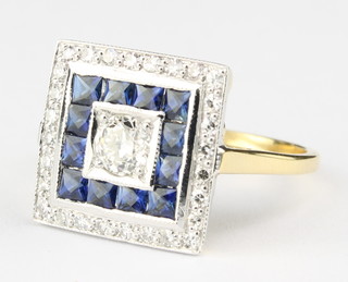 An 18ct yellow god Art Deco style square sapphire and diamond ring size N