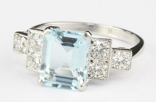 An 18ct white gold aquamarine 2.4 ct and 6 stone diamond 0.55 ct ring size N 1/2