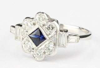 An 18ct white gold Edwardian style sapphire and diamond ring size M