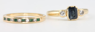2 18ct yellow gold gem set rings size K and M 
