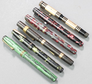 A Wyvern Pen Company green marbled B/B deluxe fountain pen, a Summit red marbled S125 pen, a Burnham red/grey marbled B48 pen with B45 Italic nib, a Swan green/black marbled pen with stuck barrel, a Waterman's black pen with 9ct gold band and a Swan leverless black pen with engine turned gilt bands 