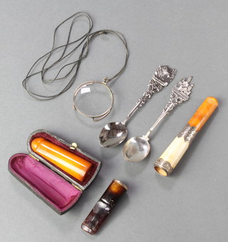 An Edwardian silver mounted amber and Meerschaum cigar holder, 2 others and minor items