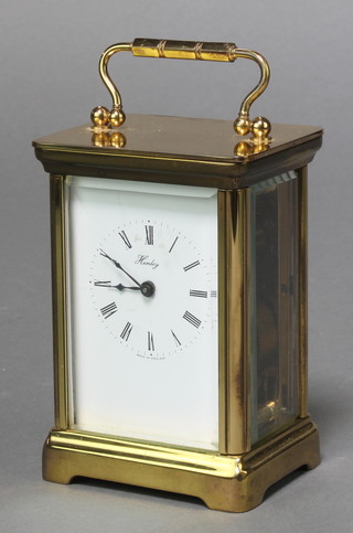 Henley, a 20th Century English 8 day carriage timepiece contained in a gilt case 4 1/2" x 3" x 2" 
