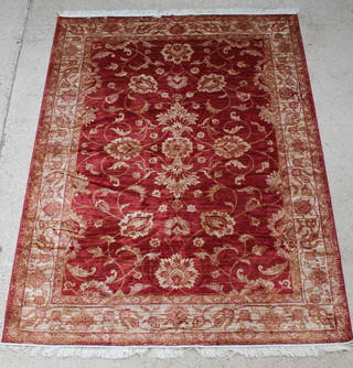 A red ground Belgian cotton Ziegler style carpet 109" x 79" 