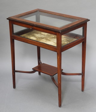 An Edwardian rectangular inlaid mahogany bijouterie table with bevelled plate top raised on square tapering supports with rectangular undertier 28"h x 24"w x 14" 