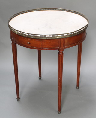 An Empire style circular mahogany and marble occasional table with pierced brass gallery, fitted 2 drawers and 2 slides, raised on turned and fluted supports 29"h x 26" diam. 