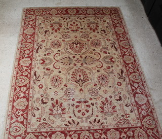 A white ground Caucasian style carpet with floral design 142" x 105" 