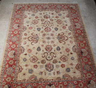 A yellow ground Caucasian style carpet with floral pattern 141" x 106" 