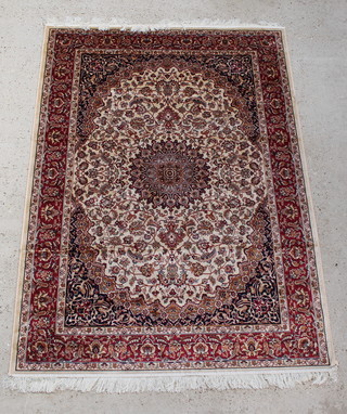 A gold coloured Kashan style Belgian cotton rug with central medallion 74 1/2" x 53" 