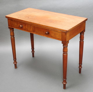 A Victorian rectangular mahogany side table fitted 2 drawers, raised on turned supports 31"h x 36"w x 18"d 