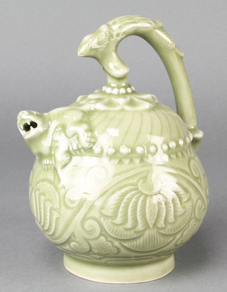A Chinese Celadon Mystery puzzle jug, the spout in the form of a Shi Shi with 6 character mark to base 7 1/2"  