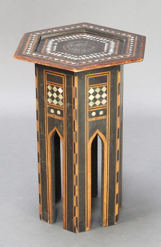 An octagonal Moorish inlaid mother of pearl table 18"h x 14"w x 13"d 