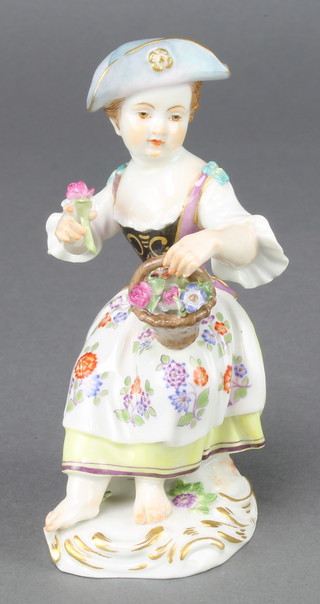 An early 20th Century Meissen figure a flower girl on a raised Rococo base 5" 