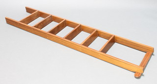 A mahogany 6 tread library ladder 63 1/2"h x 18 1/2"w x 3"d 