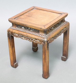 An early 20th Century Chinese carved hardwood square stand with pierced borders 8 1/2" 