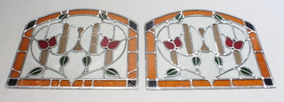 A pair of 1930's arched lead glazed window panels 22" x 25" 