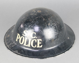 A Second World War Special Constables steel helmet marked SC Police 