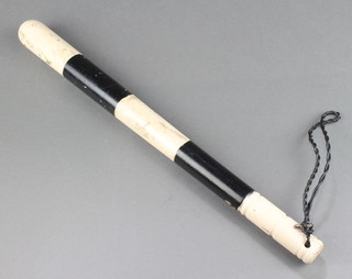 A "Russian" turned black and white painted police truncheon 16" 