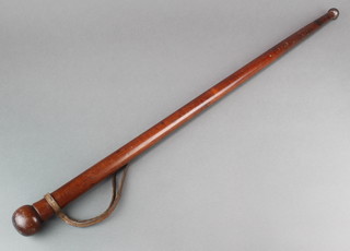 A 19th Century turned wooden Nightstick with leather strap 32" 