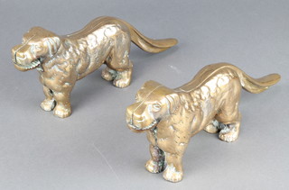 Two pairs of brass nut crackers in the form of standing dogs 5" x 12" 
