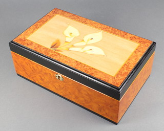 A rectangular  figured walnut finished jewellery box with hinged lid decorated lilies 5" x 12" x 8" 

