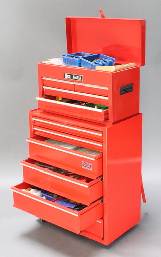 A red metal box with hinged lid fitted 2 short and 2 long drawers containing various yellow and blue pieces of Meccano 13" x 21" x 10" together with a red painted metal chest of 6 drawers containing a No.6 Meccano set, various red , green and blue pieces of Meccano etc 