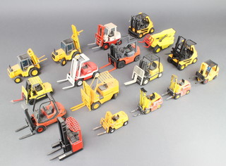 A Dinky model of a Conveyancer fork lift truck and other models of fork lift trucks 