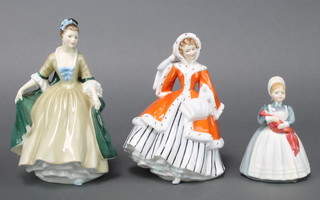 Three Royal Doulton figures - The Rag Doll HN2142 4 1/2" and Noelle HN2179 7 1/2" and Elegance HN2264 7 1/2" 
