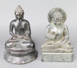 A bronze figure of a seated buddha 10" x  7", a carved hardstone figure of a seated buddha 10" x 6" x 3"