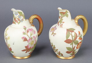 A pair of Worcester blush porcelain jugs decorated with spring flowers 1094 5" 