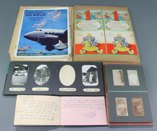 A 1930's scrapbook, a 1938 Daily Express Air Display Gatwick Airport souvenir programme, 2 small black and white photograph albums and a sketch album 