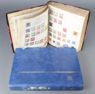An album of GB and World mint and used stamps including a penny black, 3 penny reds, 2 penny blues, together with a blue stock book of World stamps
