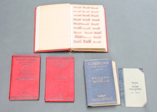 A red stock book containing George V and Edward VIII used GB stamps and a collection of loose World stamps 
