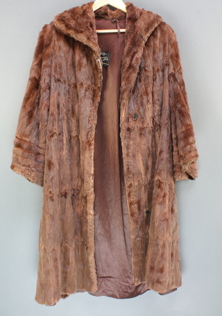 A lady's full length brown mink coat by Hensy of 57 Wigmore Street  