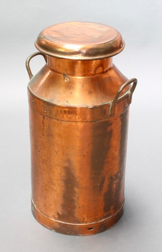A copper twin handled milk churn marked DRIED MILK TVD Torrington and stamped 2800 27"h x 13" diam. 