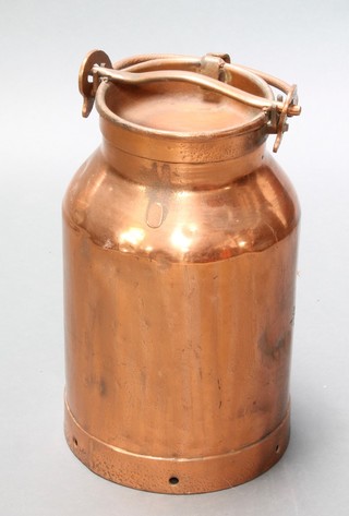A circular copper milk churn with lid 20"h x 12" diam. 