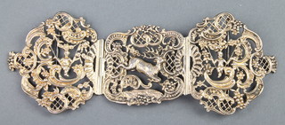 A good Victorian silver gilt 3 piece buckle decorated with deer, cherubs, scrolls and flowers London 1898, maker William Comyns & Sons Ltd, 92 grams 