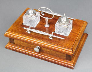 A modern 2 bottle ink stand with fitted drawer and 2 silver quill pens 