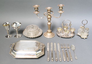 A silver plated mounted butter dish, an egg cruet and minor plated items