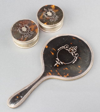 A silver and tortoiseshell pique hand mirror and 2 circular trinket boxes London 1922 