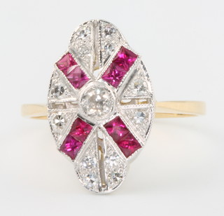 An 18ct yellow gold ruby and diamond Art Deco style cocktail ring, size O 
