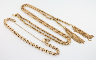 A 9ct yellow gold rope twist necklace with tassels and a plain link bracelet 23.4 grams